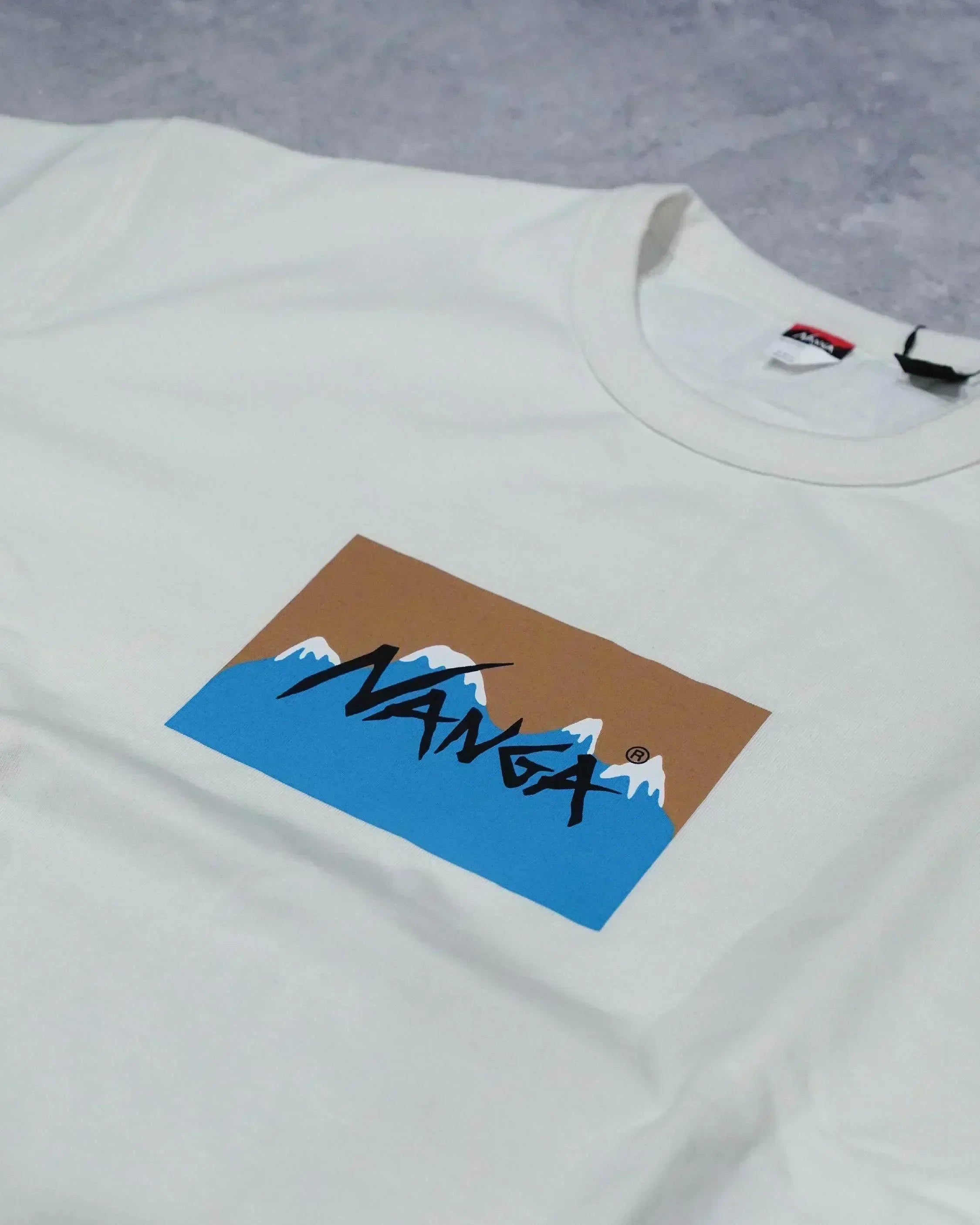 Nanga × Jerry Ukai ECO HYBRID Box Logo Tee - Wild Camping