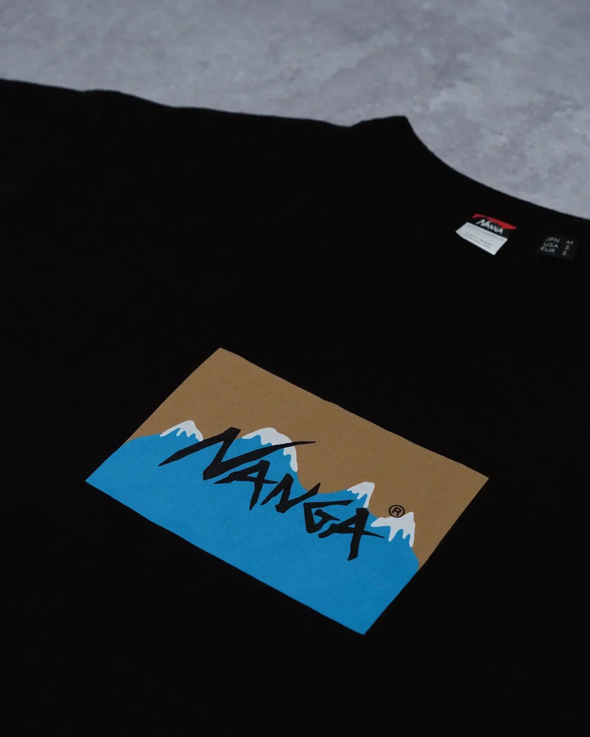 Nanga × Jerry Ukai ECO HYBRID Box Logo Tee - Wild Camping
