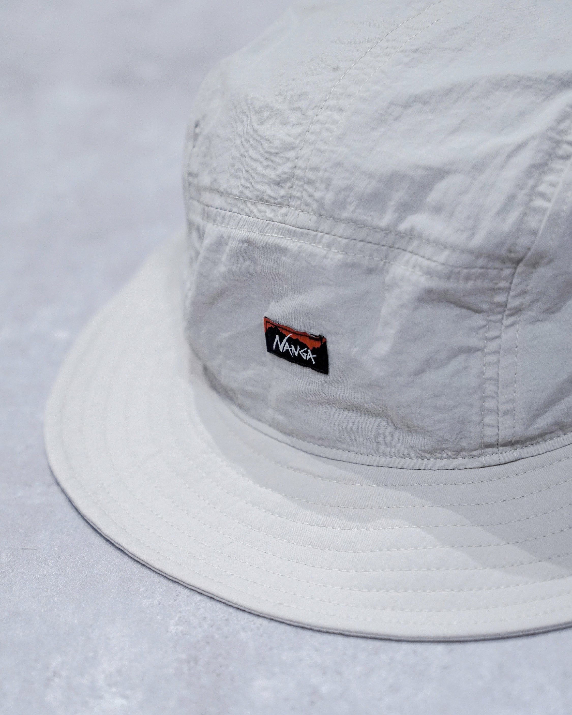 Nanga Tusser Sunshade Bucket Hat